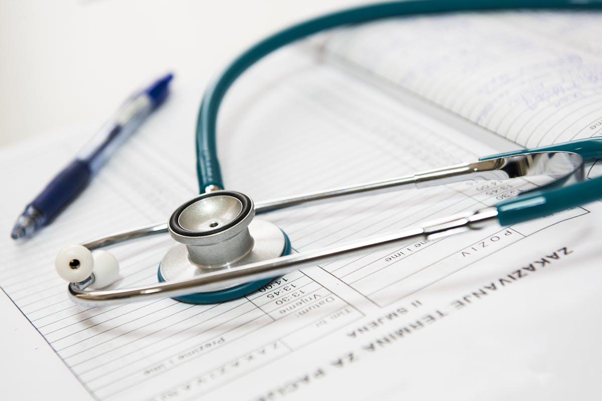 A doctor explaining a medical chart to a patient.
