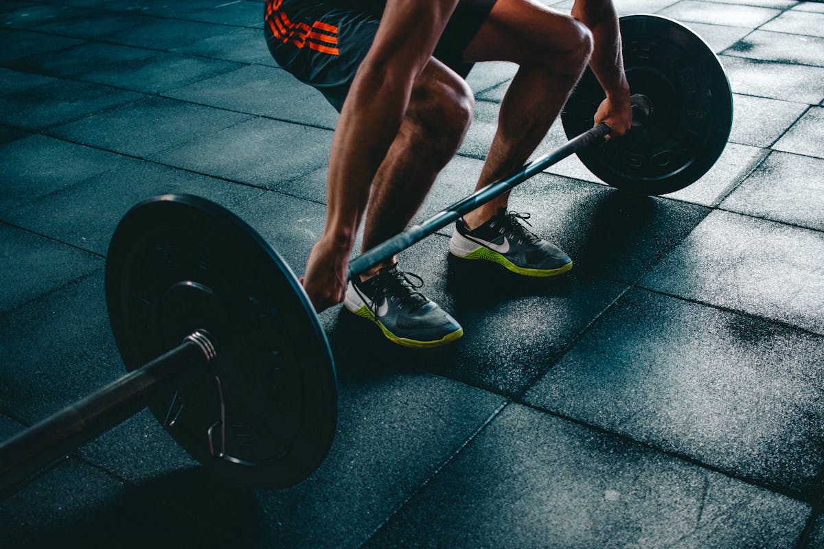 A muscular person lifting weights.